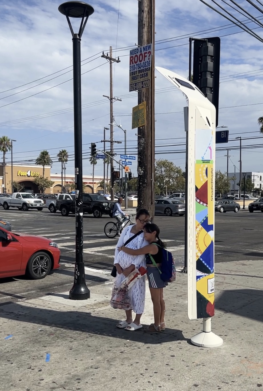 Mom and Daughter Love at the ShadeBlade Bus Stop